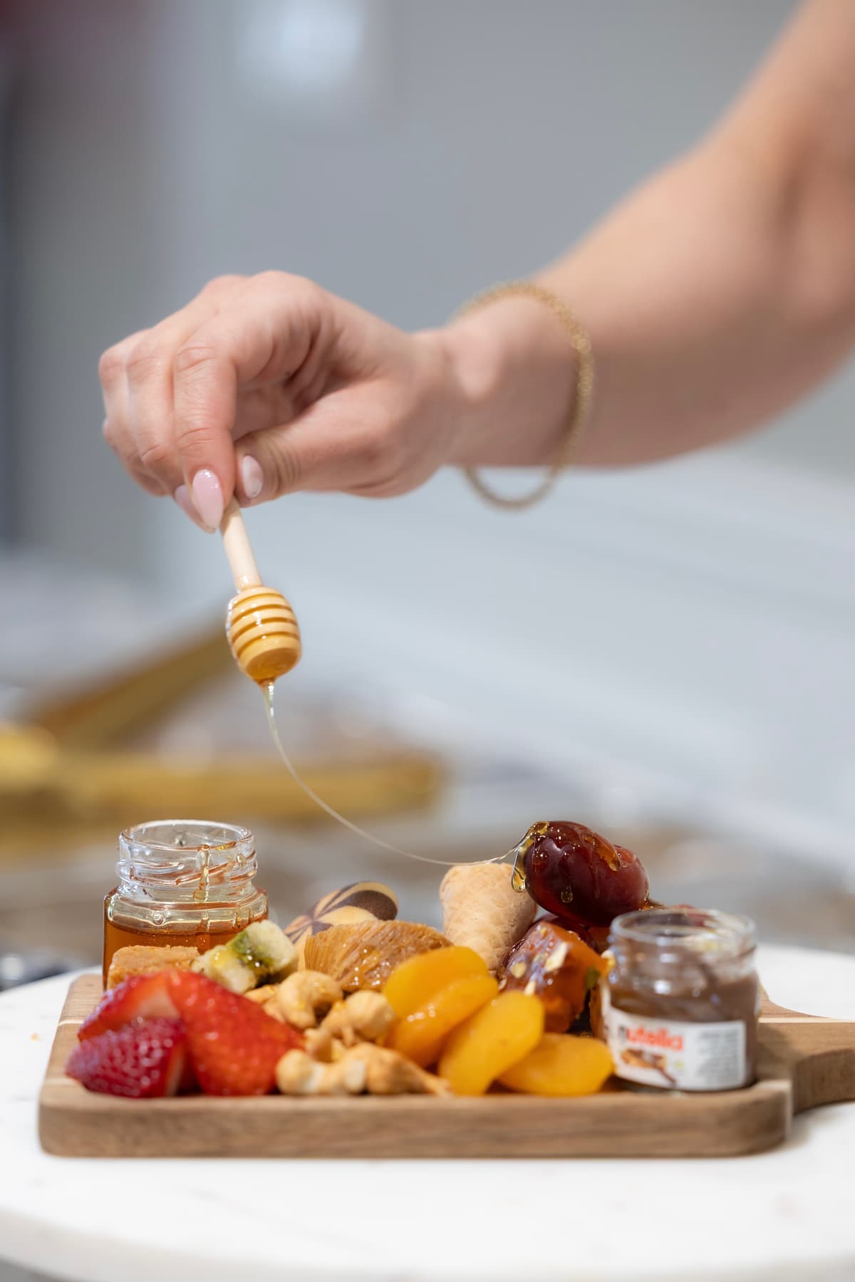 Honey drizzle on charcuterie board
