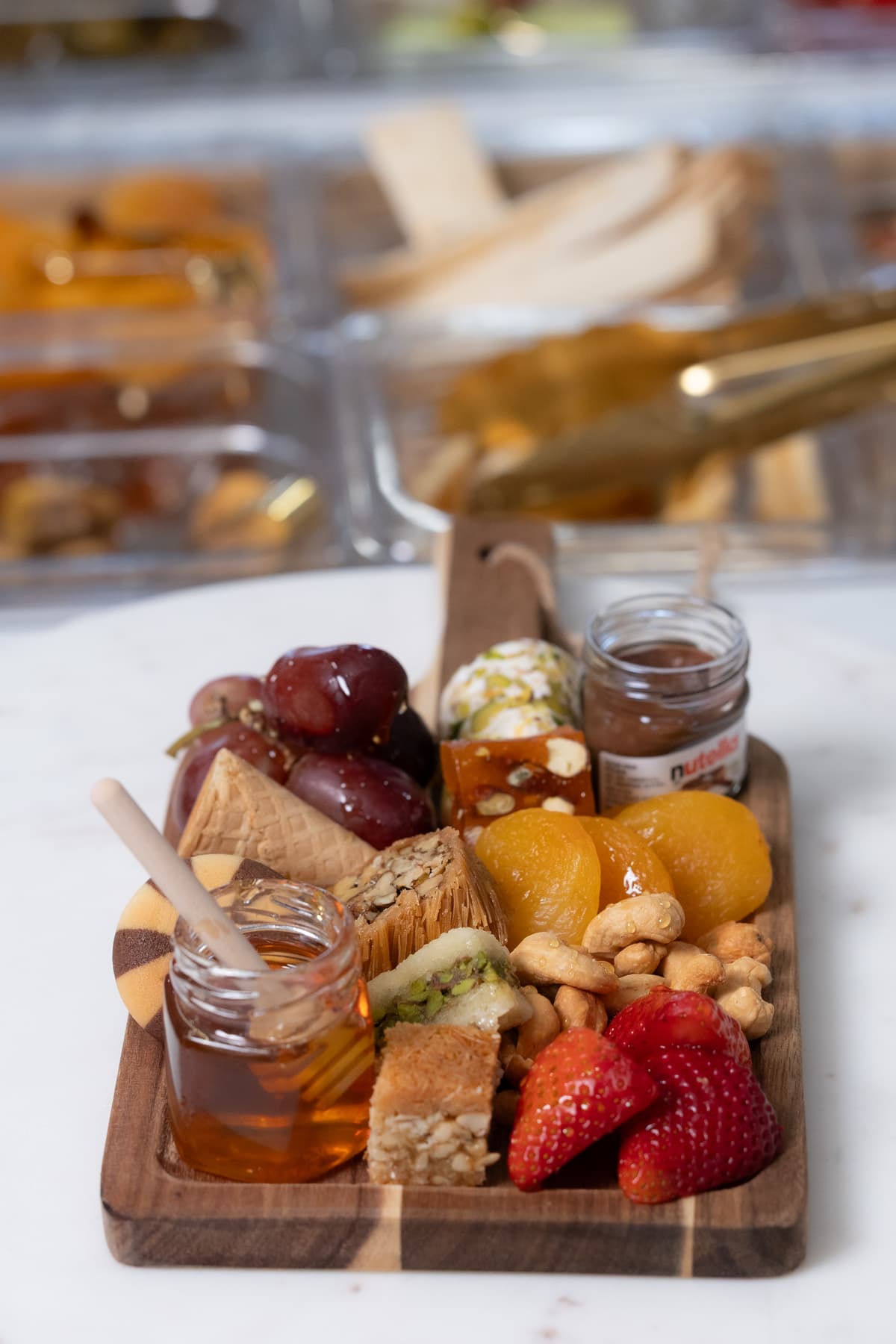 Sweet board with honey and baklava