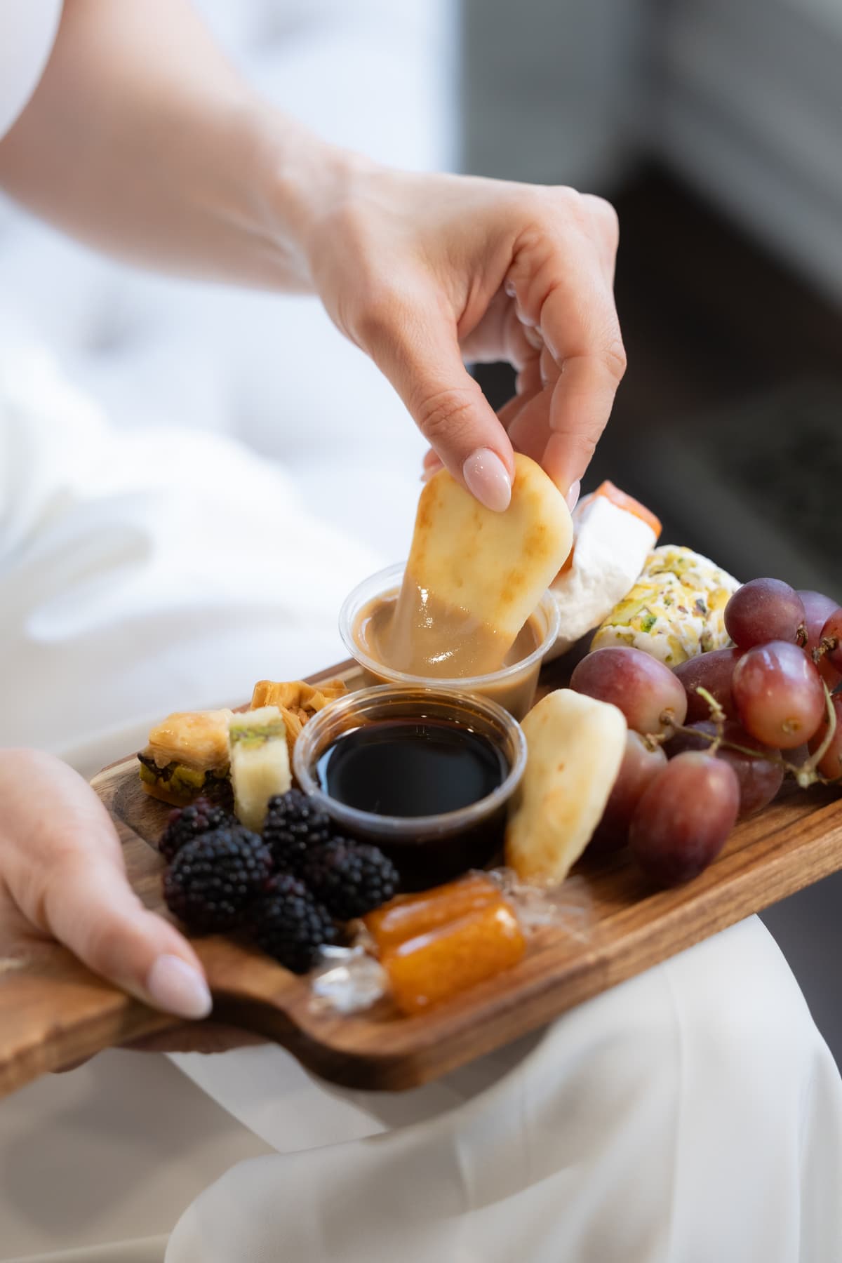 Dipping pita in sweet board